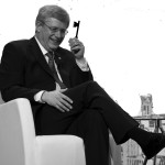 Prime Minister Stephen Harper smiles during a question and answer period following a luncheon speech Friday, November 15, 2013 in Montreal. THE CANADIAN PRESS/Paul Chiasson