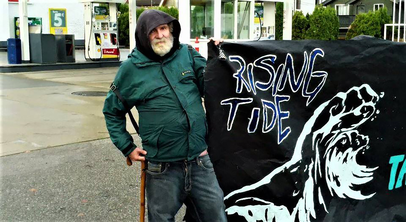 Harold Lavender with Rising Tide, fighting for an anti-capitalist solution to climate change
