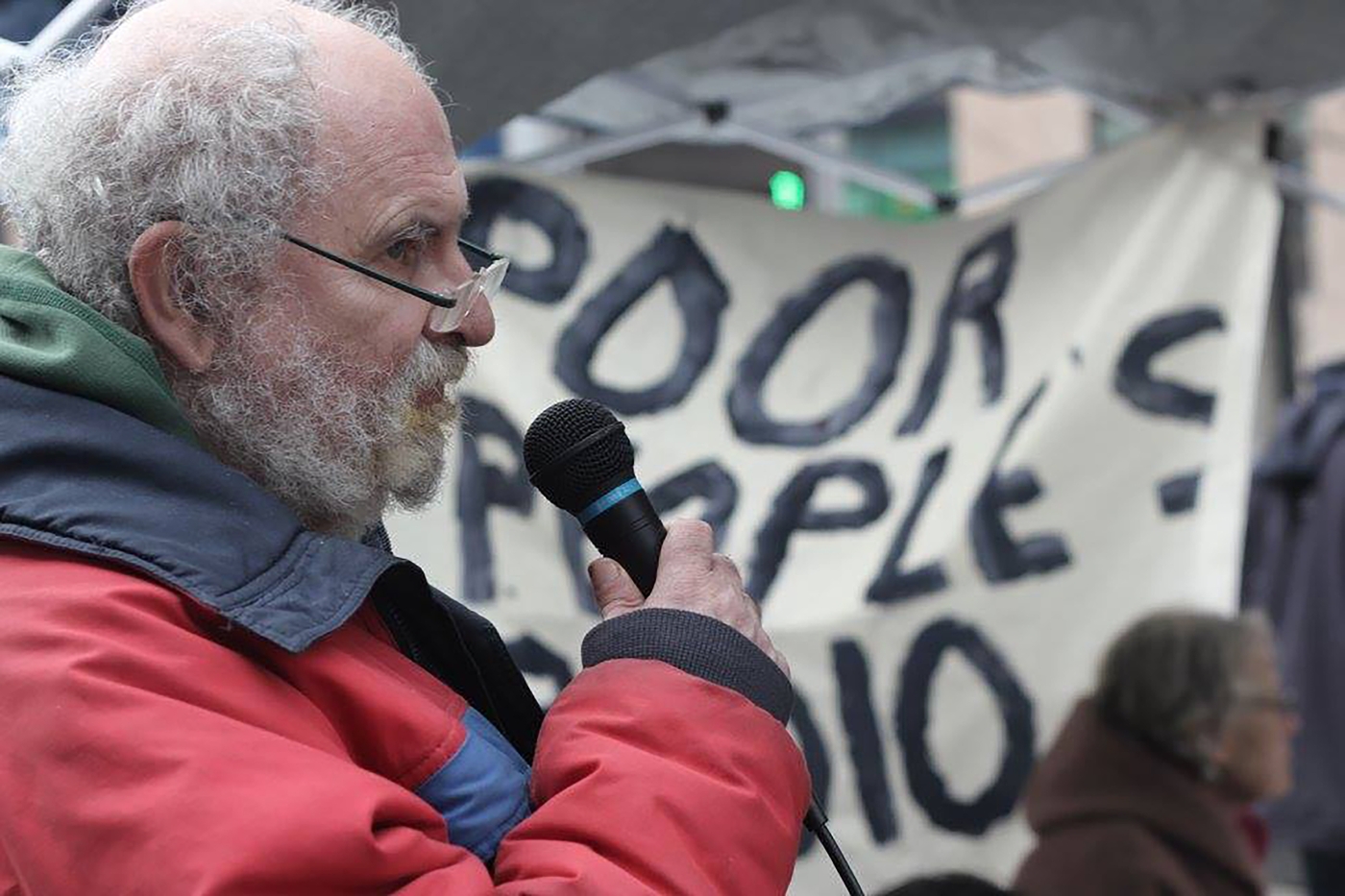 Harold Lavender speaking at a DTES march